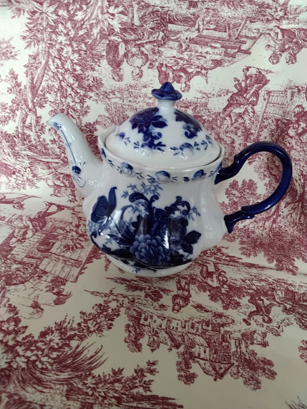 Elegant Blue Floral Porcelain Teapot with Decorative Handle
